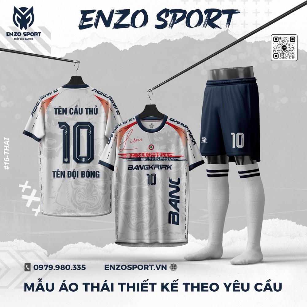 Áo bóng đá Enzo Sport màu trắng phối xanh navy và cam san hô, thiết kế thể thao hiện đại